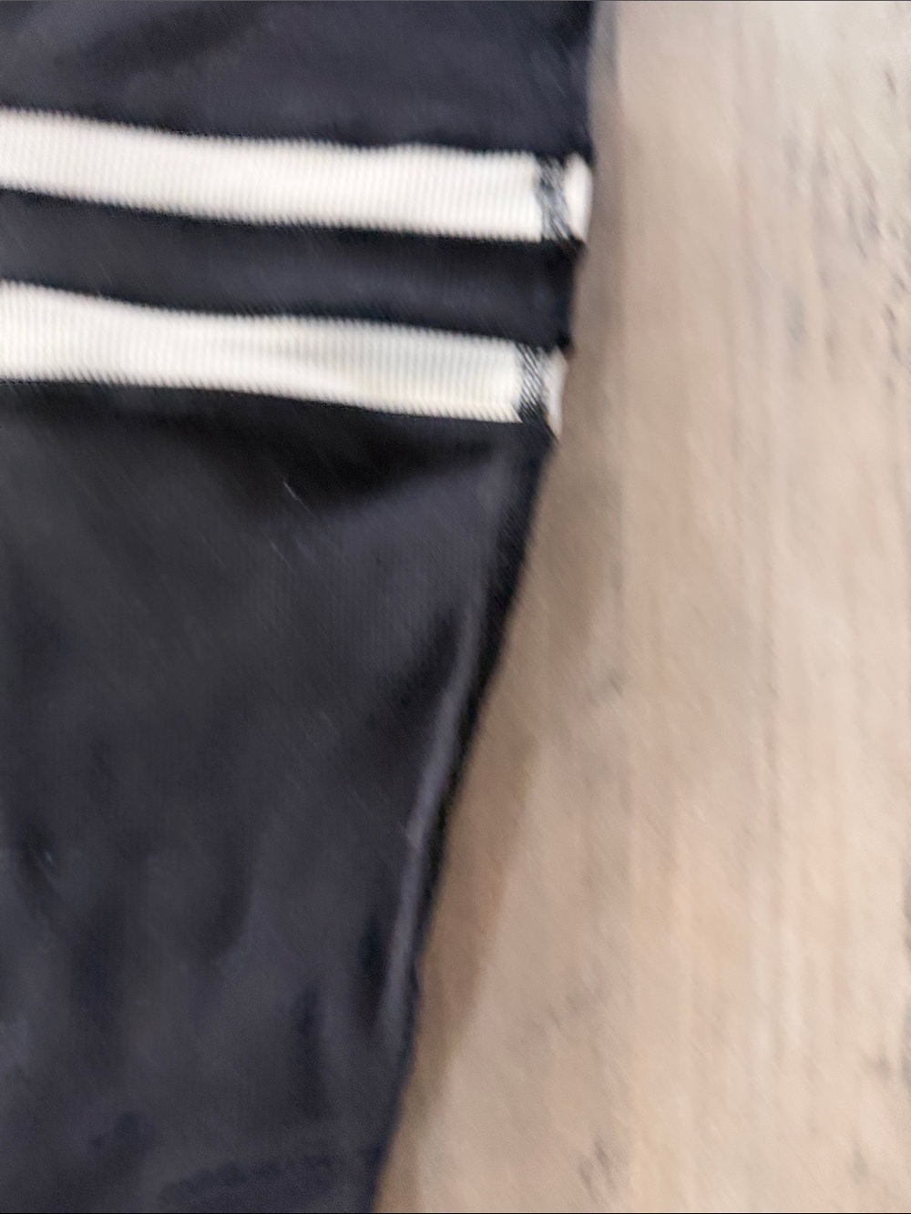 Alo Medium Ribbed Black Leggings with White Striped Knee Details - Picture 5 of 11